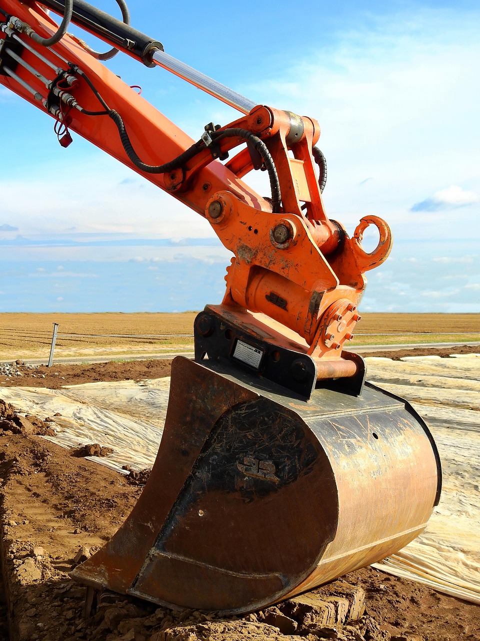 our-story excavator, machine, construction machine, construction site, building, tool, excavator bucket, work, shovel, dig, earth, excavation, dredge, vehicle, to build, construction vehicle, construction work, work machine, technology, tracked vehicle, excavator, excavator, excavator, excavator, excavator, excavation, excavation